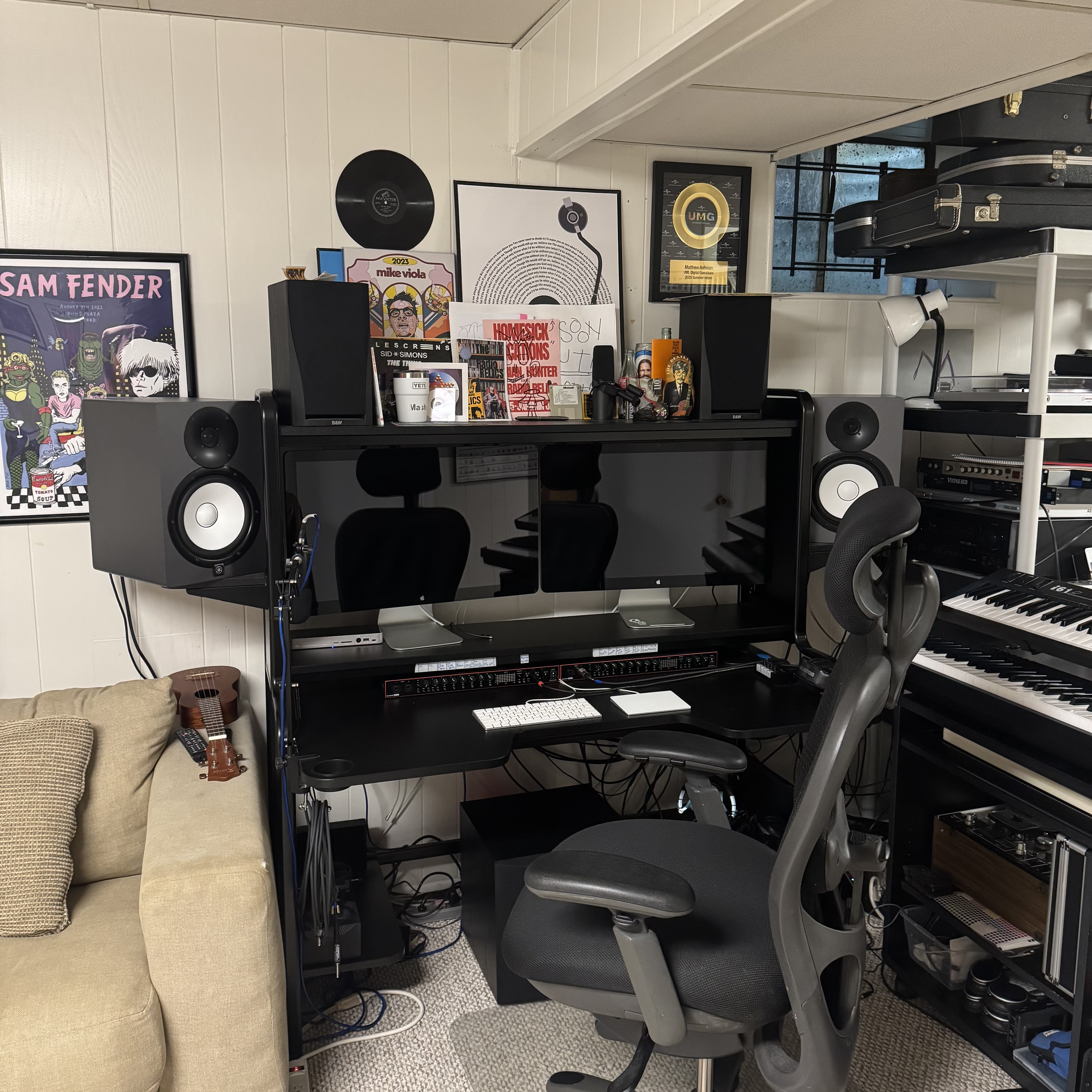 Control room with mixing desk and monitors
